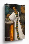 Ethiopian Woman in traditional attire baking Injera